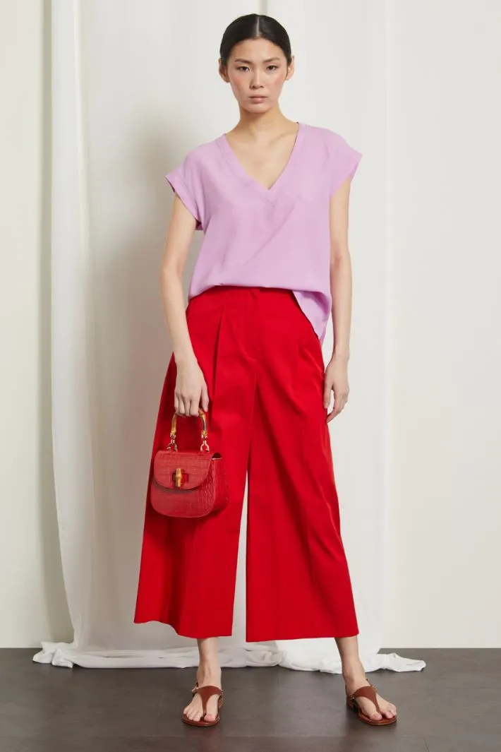 Blusa in crêpe de chine